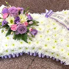 Pillow edged in lilac